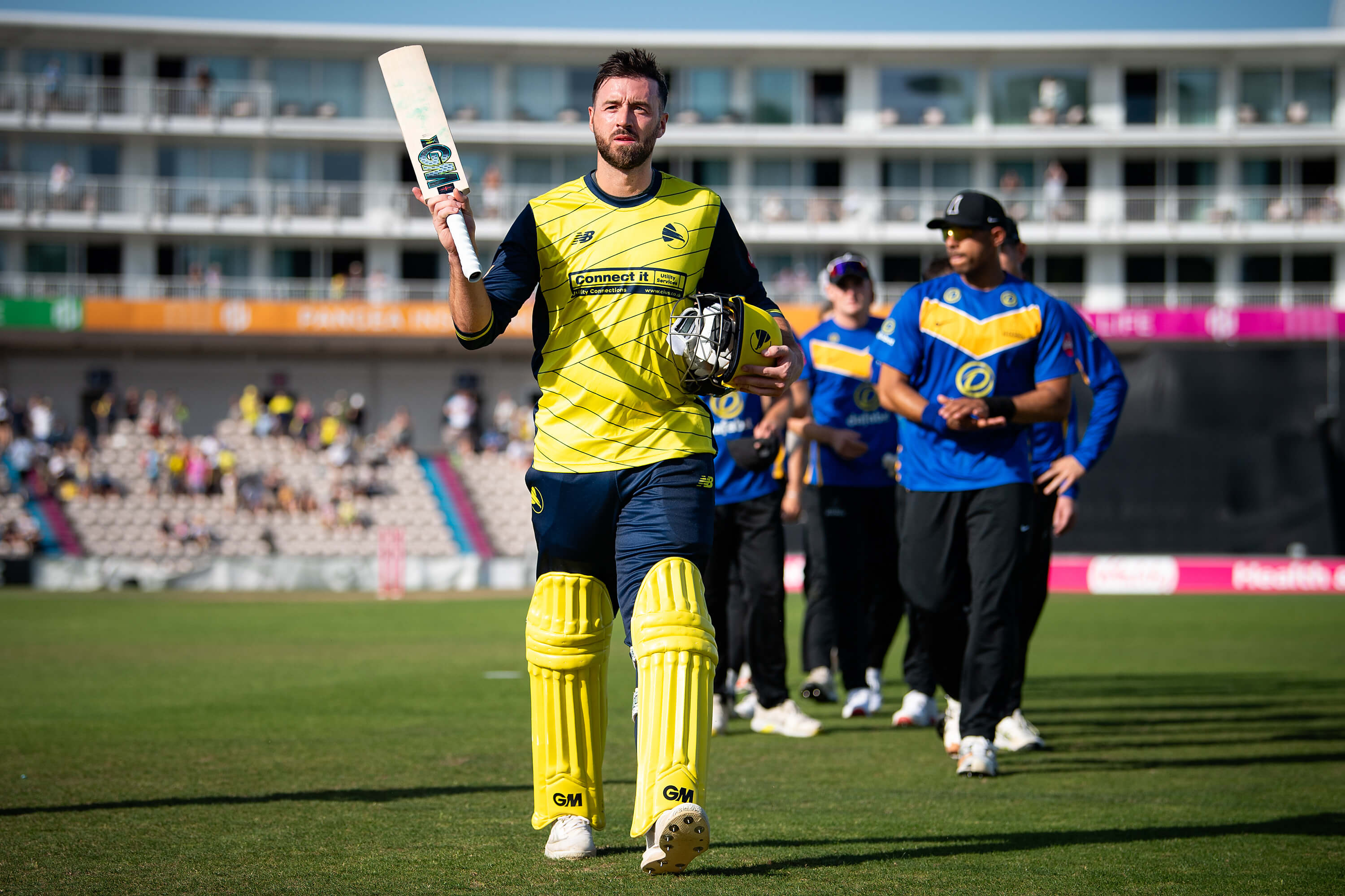 James Vince waves his bat to the crowd after hitting the winning runs against Sussex Sharks