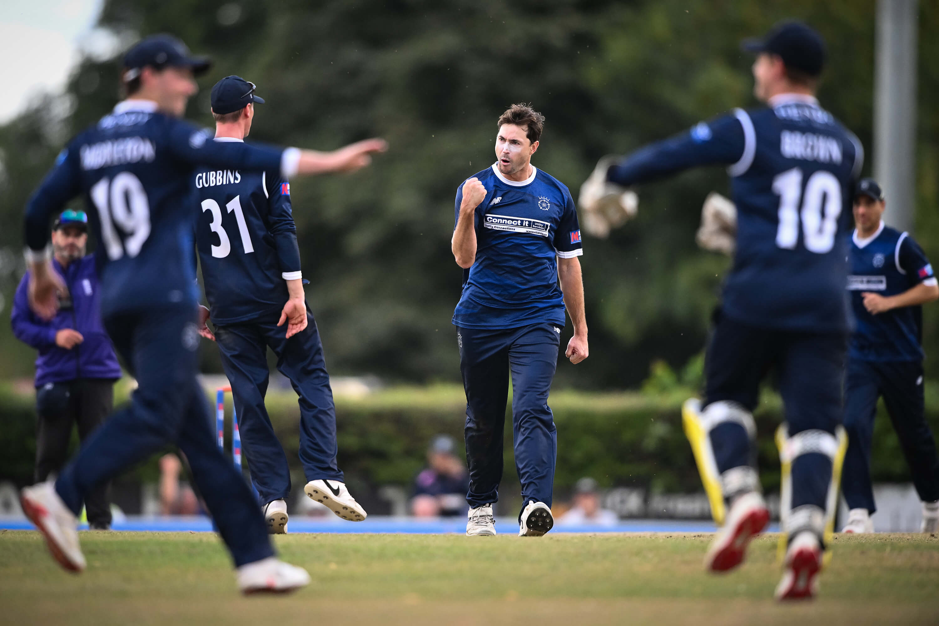 James Fuller celebrates the wicket of Zafar Gohar during the One Day Cup quarter-final at Radlett