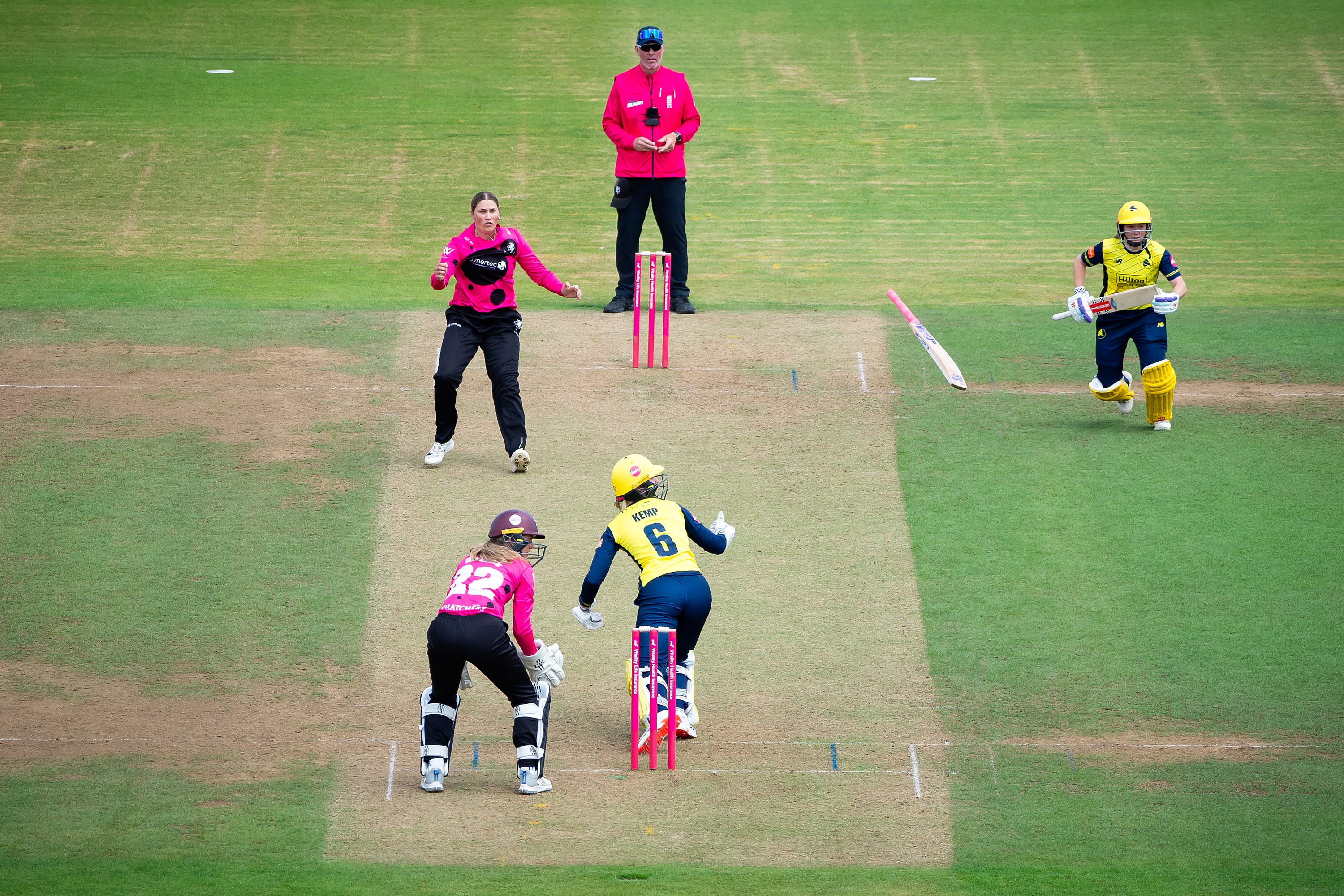 Freya Kemp loses grip of her bat as she looks to sweep against Somerset's Alex Griffiths