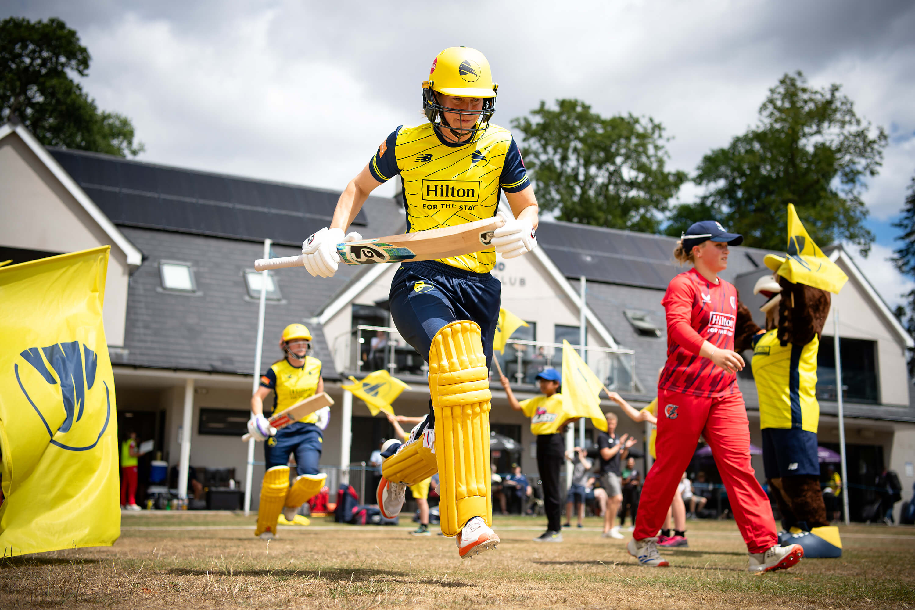 Ellyse Perry running out to bat during the Women's Vitality Blast match between Hampshire Hawks and Lancashire Thunder at Falkland Cricket Club